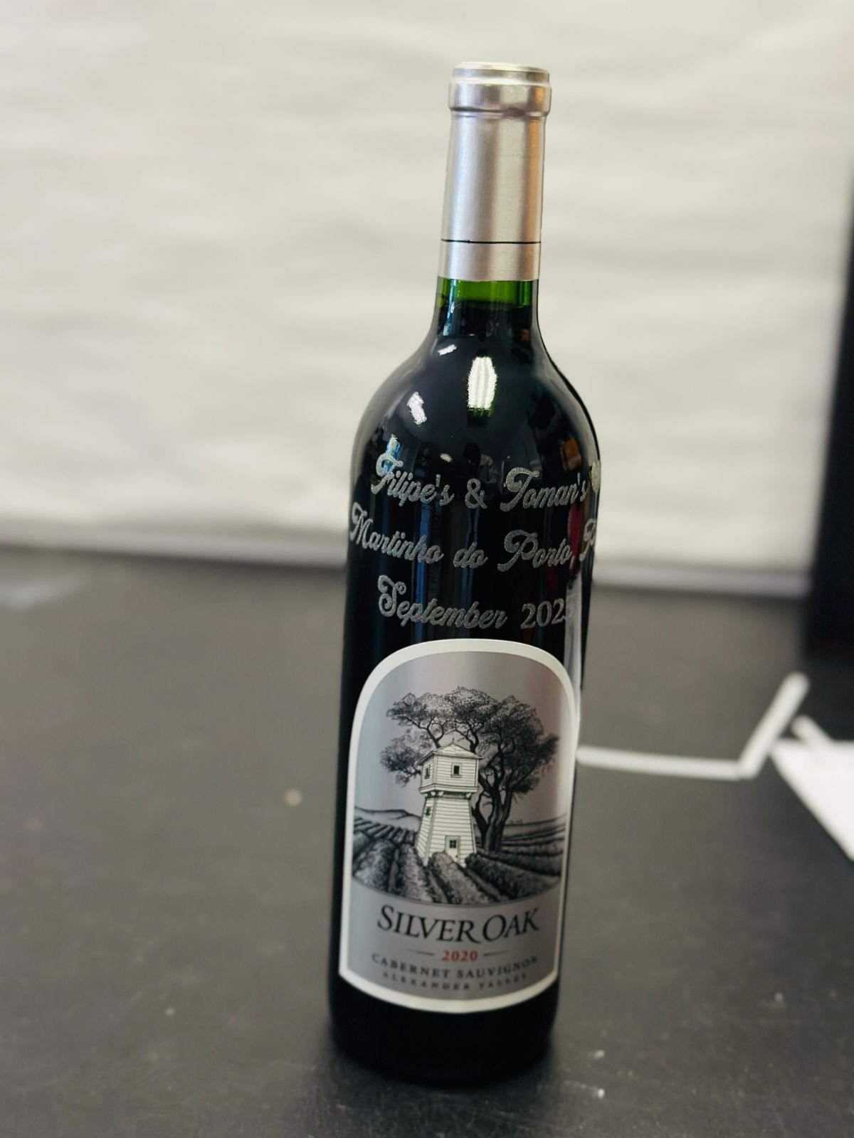 Wine bottle engraved with a name and date